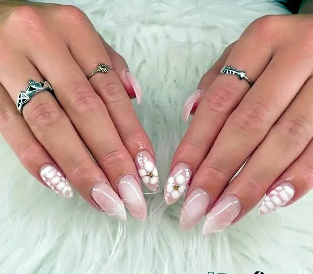 Milky pink almond nails with white 3D flowers